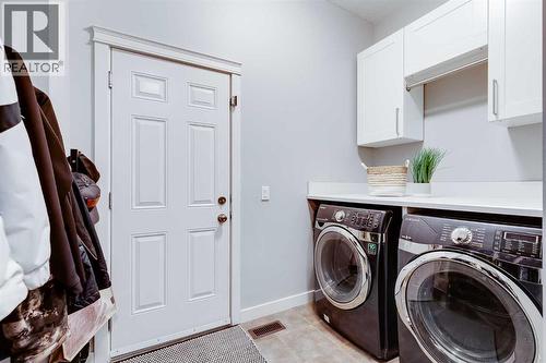31 St Moritz Terrace Sw, Calgary, AB - Indoor Photo Showing Laundry Room