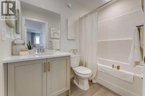 PLEASE NOTE: Photos are of a finished Showhome of the same model – fit and finish may differ on finished spec home. Interior selections and floorplans shown in photos - 62 Starling Boulevard Nw, Calgary, AB - Indoor Photo Showing Bathroom