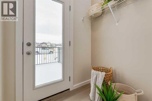 PLEASE NOTE: Photos are of a finished Showhome of the same model – fit and finish may differ on finished spec home. Interior selections and floorplans shown in photos - 62 Starling Boulevard Nw, Calgary, AB - Indoor