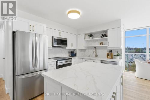 711 - 1600 Charles Street, Whitby (Port Whitby), ON - Indoor Photo Showing Kitchen With Stainless Steel Kitchen With Upgraded Kitchen