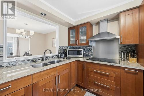 69 - 6767 Thorold Stone Road, Niagara Falls (Stamford), ON - Indoor Photo Showing Kitchen With Double Sink