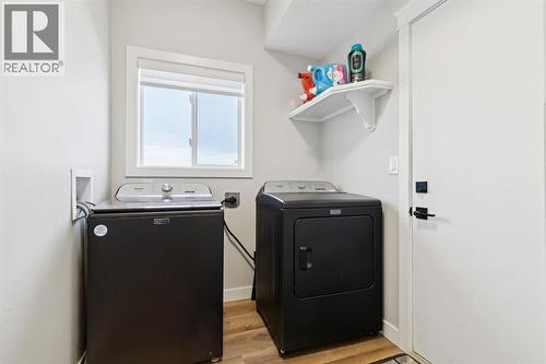 230 Chaparral Place Se, Calgary, AB - Indoor Photo Showing Laundry Room