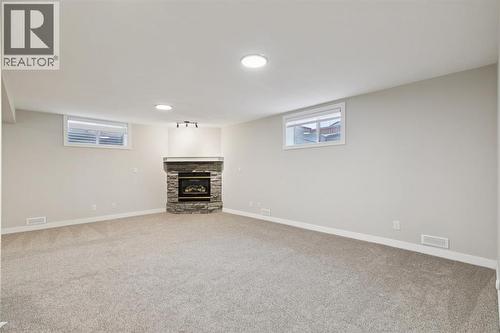 230 Chaparral Place Se, Calgary, AB - Indoor With Fireplace