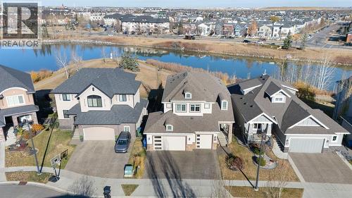 52 Elgin Estates View Se, Calgary, AB - Outdoor With Body Of Water With Facade