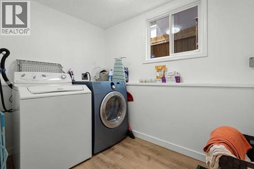 40 Bergen Place Nw, Calgary, AB - Indoor Photo Showing Laundry Room