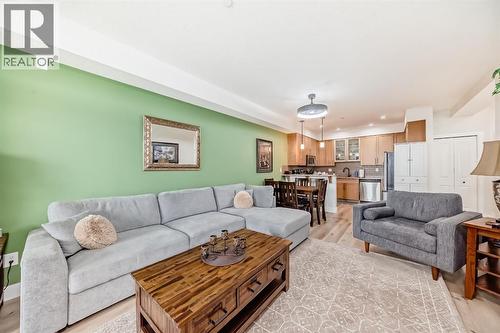 111, 1005B Westmount Drive, Strathmore, AB - Indoor Photo Showing Living Room