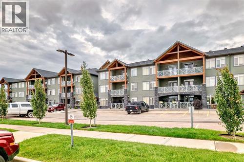 111, 1005B Westmount Drive, Strathmore, AB - Outdoor With Facade