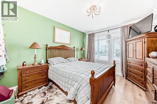 111, 1005B Westmount Drive, Strathmore, AB - Indoor Photo Showing Bedroom
