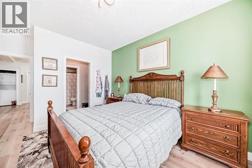 111, 1005B Westmount Drive, Strathmore, AB - Indoor Photo Showing Bedroom