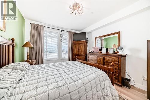 111, 1005B Westmount Drive, Strathmore, AB - Indoor Photo Showing Bedroom