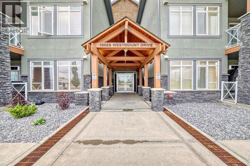 111, 1005B Westmount Drive, Strathmore, AB - Outdoor With Facade