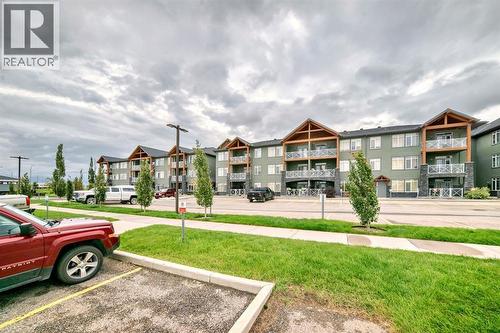 111, 1005B Westmount Drive, Strathmore, AB - Outdoor With Facade