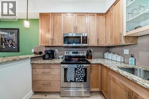 111, 1005B Westmount Drive, Strathmore, AB - Indoor Photo Showing Kitchen