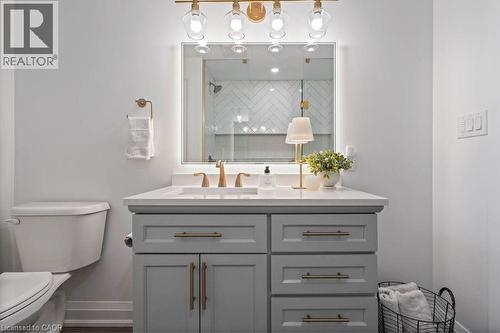 Full bath with vanity and tiled shower - 151 Fair Street, Ancaster, ON 