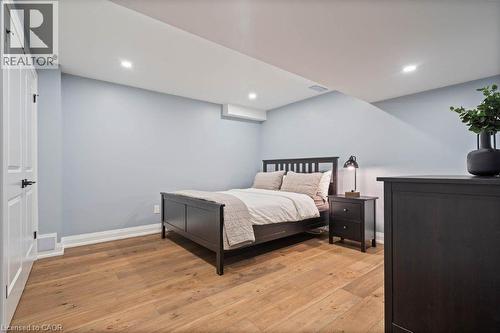 Bedroom featuring light wood finished floors and recessed lighting - 151 Fair Street, Ancaster, ON 