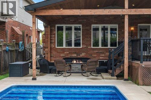 View of swimming pool featuring a patio and an outdoor living space - 151 Fair Street, Ancaster, ON 