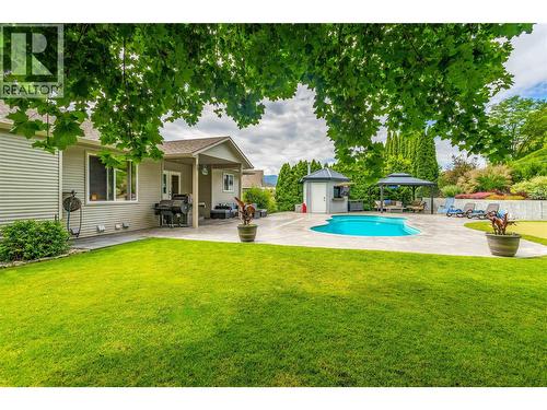 1492 Longley Crescent, Kelowna, BC - Outdoor With In Ground Pool With Deck Patio Veranda