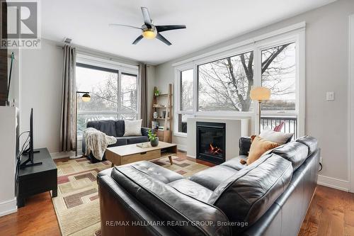 2nd Floor - Living Room - 1111 North River Road, Ottawa, ON - Indoor Photo Showing Living Room With Fireplace