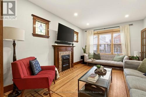 22 Mill Street, Hamilton, ON - Indoor Photo Showing Living Room With Fireplace