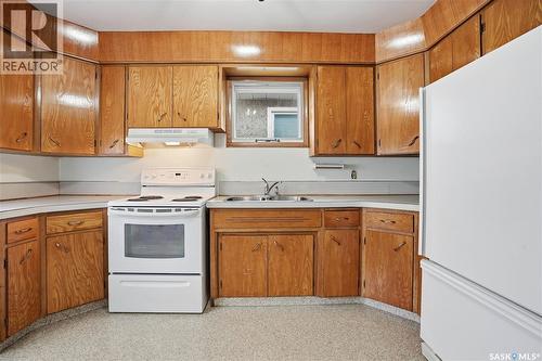 2269 Reynolds Street, Regina, SK - Indoor Photo Showing Kitchen With Double Sink