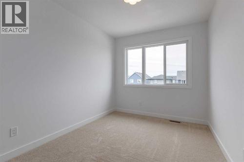 281 Cobblestone Gate, Airdrie, AB - Indoor Photo Showing Other Room