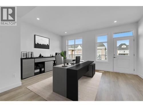 Photo is virtually staged to show possibilities of the office/work space. - 5300 Main Street Unit# 118, Kelowna, BC - Indoor Photo Showing Office