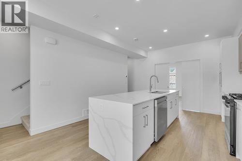 Photos may be of a similar home in the community - 5300 Main Street Unit# 118, Kelowna, BC - Indoor Photo Showing Kitchen With Upgraded Kitchen