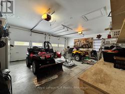 Fully finished and in-floor heated garage. - 