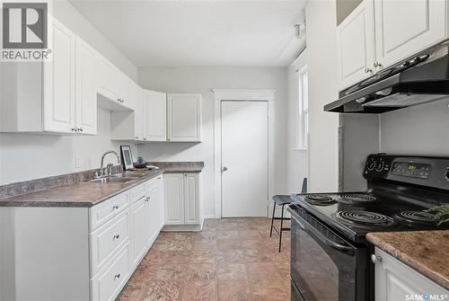 320 D Avenue S, Saskatoon, SK - Indoor Photo Showing Kitchen With Double Sink