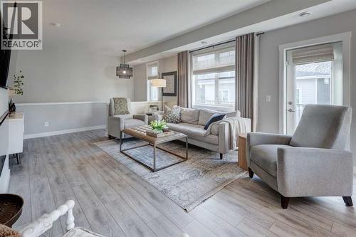 405 Cranbrook Walk Se, Calgary, AB - Indoor Photo Showing Living Room
