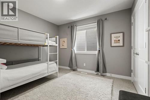 85 Mount Rae Heights, Okotoks, AB - Indoor Photo Showing Bedroom
