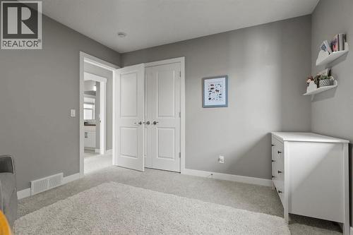 85 Mount Rae Heights, Okotoks, AB - Indoor Photo Showing Other Room