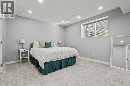 85 Mount Rae Heights, Okotoks, AB - Indoor Photo Showing Bedroom