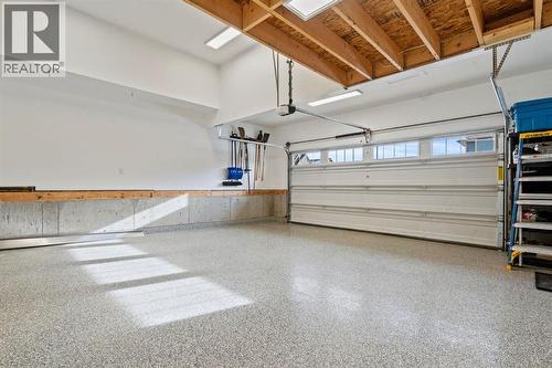 85 Mount Rae Heights, Okotoks, AB - Indoor Photo Showing Garage