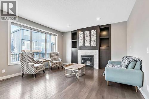 94 Cimarron Springs Circle, Okotoks, AB - Indoor Photo Showing Living Room With Fireplace