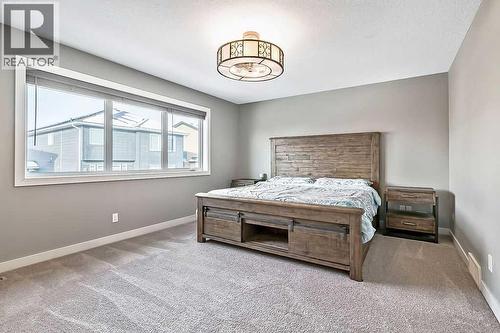 94 Cimarron Springs Circle, Okotoks, AB - Indoor Photo Showing Bedroom