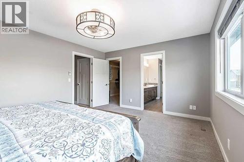 94 Cimarron Springs Circle, Okotoks, AB - Indoor Photo Showing Bedroom