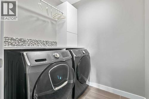 94 Cimarron Springs Circle, Okotoks, AB - Indoor Photo Showing Laundry Room