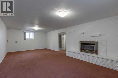 315 Dieppe Boulevard S, Lethbridge, AB - Indoor With Fireplace