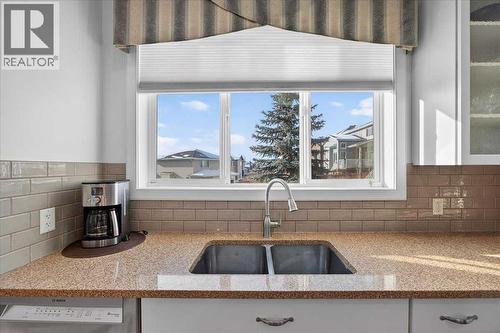 28 Evansview Manor Nw, Calgary, AB - Indoor Photo Showing Kitchen With Double Sink