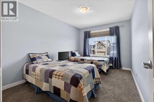 28 Evansview Manor Nw, Calgary, AB - Indoor Photo Showing Bedroom