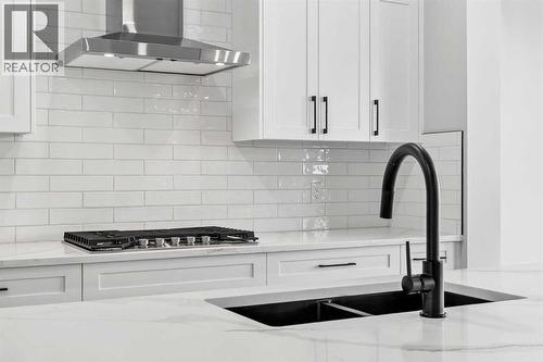 180 Wildrose Drive, Strathmore, AB - Indoor Photo Showing Kitchen With Double Sink With Upgraded Kitchen