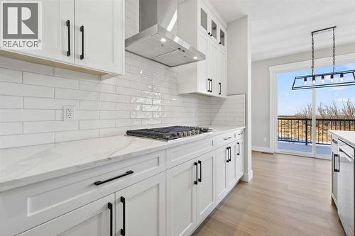 180 Wildrose Drive, Strathmore, AB - Indoor Photo Showing Kitchen With Upgraded Kitchen