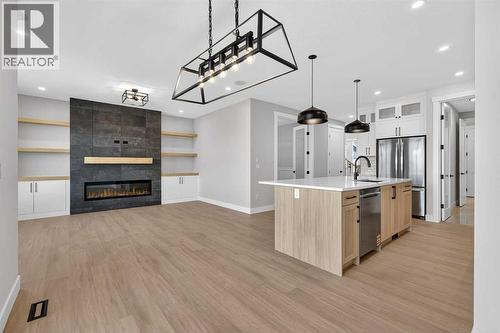 180 Wildrose Drive, Strathmore, AB - Indoor Photo Showing Other Room With Fireplace