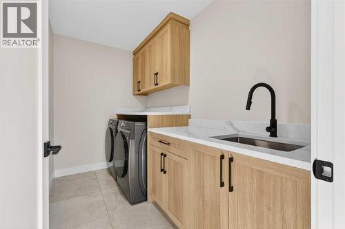 180 Wildrose Drive, Strathmore, AB - Indoor Photo Showing Laundry Room