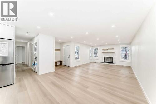 1242 Mardale Drive Ne, Calgary, AB - Indoor With Fireplace