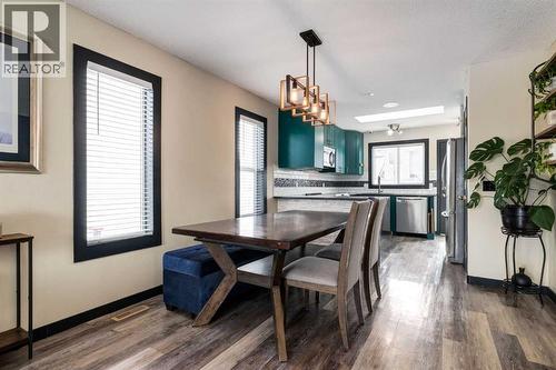 140 Stonegate Close Nw, Airdrie, AB - Indoor Photo Showing Dining Room