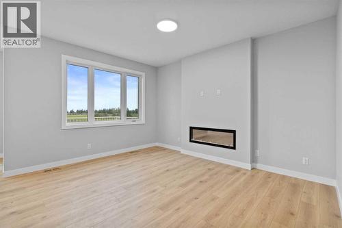 151 Belvedere Crescent Se, Calgary, AB - Indoor With Fireplace