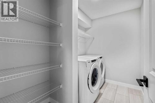 151 Belvedere Crescent Se, Calgary, AB - Indoor Photo Showing Laundry Room