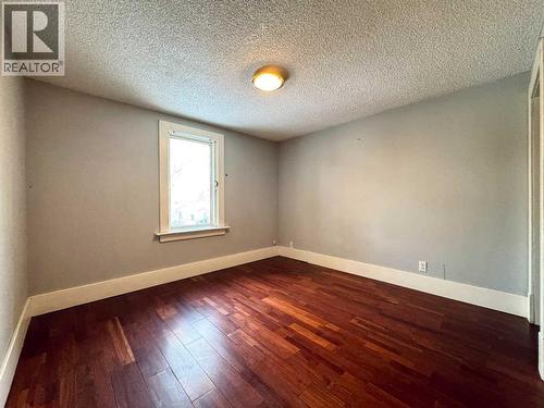 Primary Bedroom - 718 10 Street S, Lethbridge, AB - Indoor Photo Showing Other Room